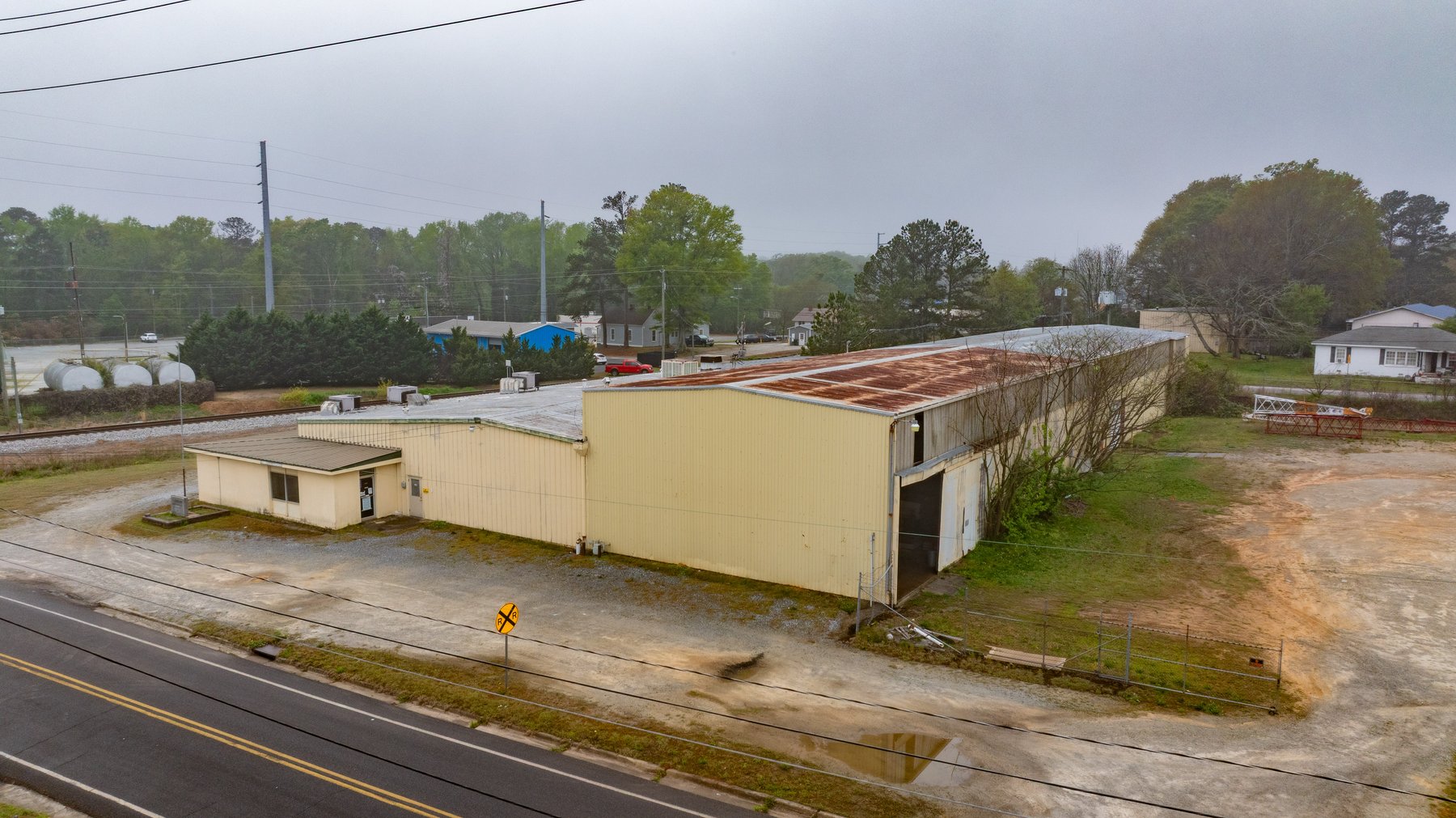 Image for Williams Street Commercial Property and Overhead Cranes 1.86+/- Acres with Large Shop and Office Facility