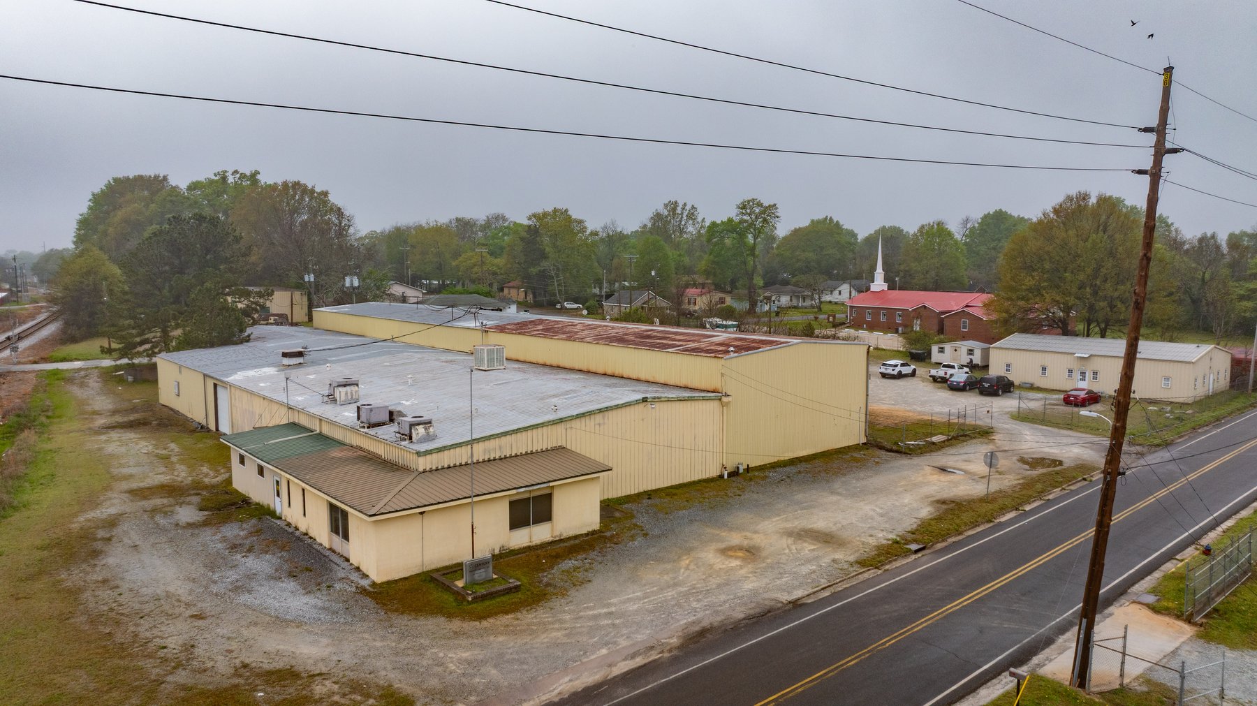 Image for Williams Street Commercial Property and Overhead Cranes 1.86+/- Acres with Large Shop and Office Facility
