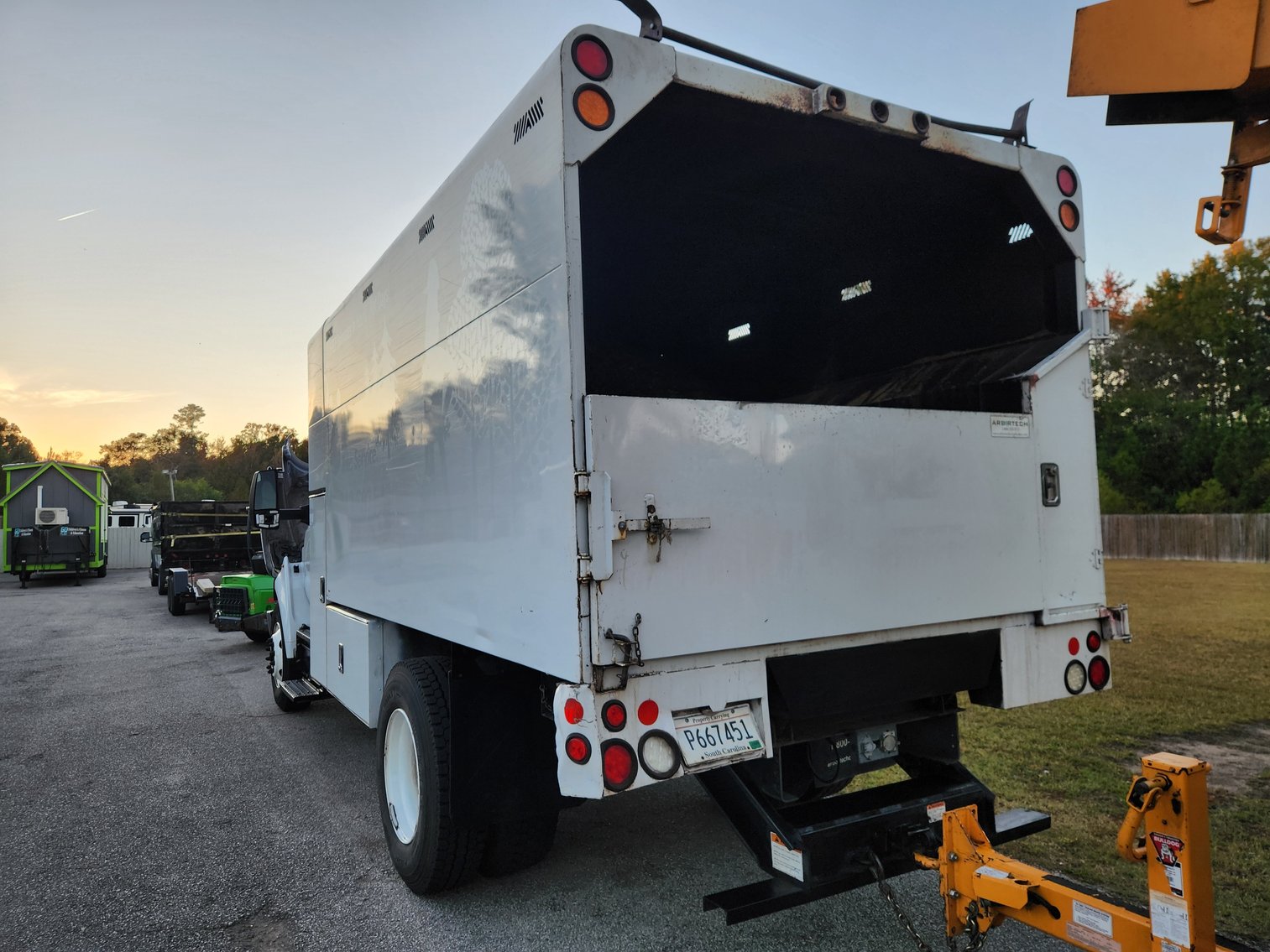 Image for North Charleston, SC: CAT 308C CR Excavator & Ford F-750 Chipper Truck