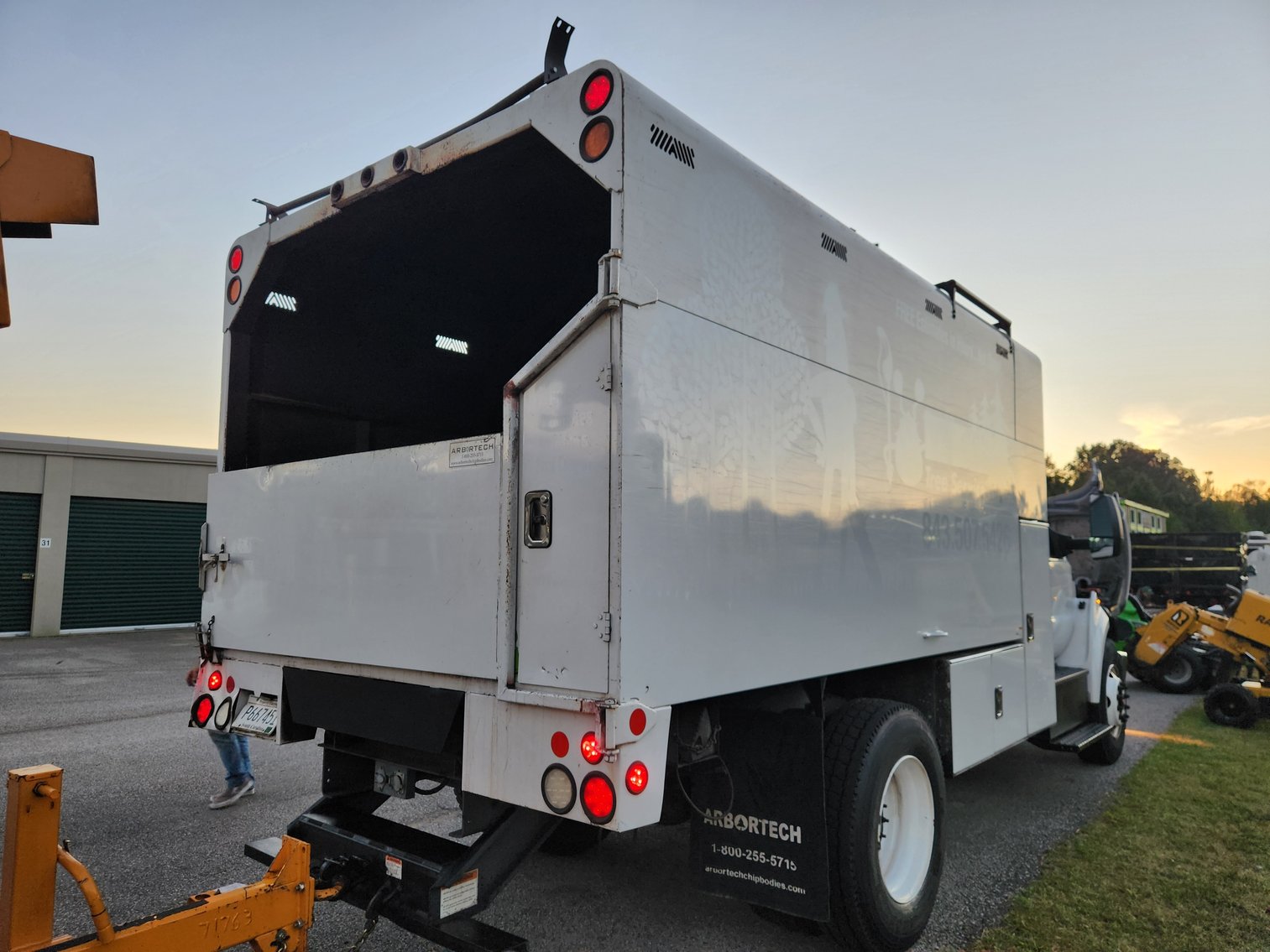 Image for North Charleston, SC: CAT 308C CR Excavator & Ford F-750 Chipper Truck