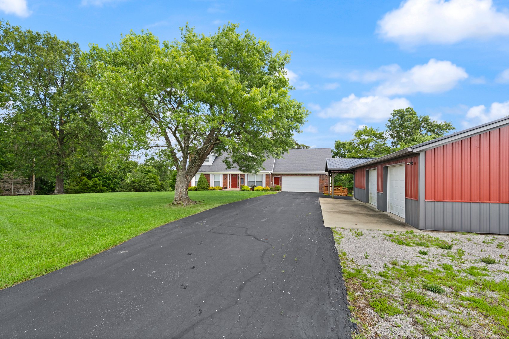 Image for Harrison County Real Estate Auction,  Cape Cod on 9.87 Acres, Inground Pool, Koi Pond & Finished Walkout - ONLINE AUCTION ONLY