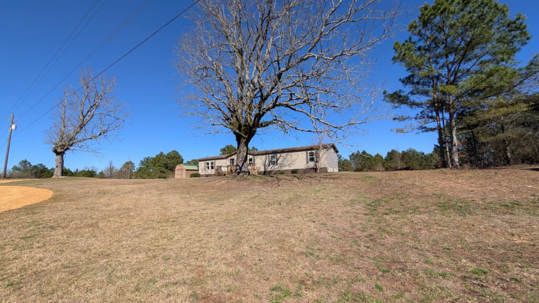 Image for ONLINE AUCTION!  2015 DOUBLEWIDE 4 BR, 2 BA HOME & 66.45 ACRES+/- IN 7 TRACTS NEAR HAMILTON, AL