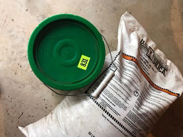 ASPHALT PATCH & BAG OF SAND