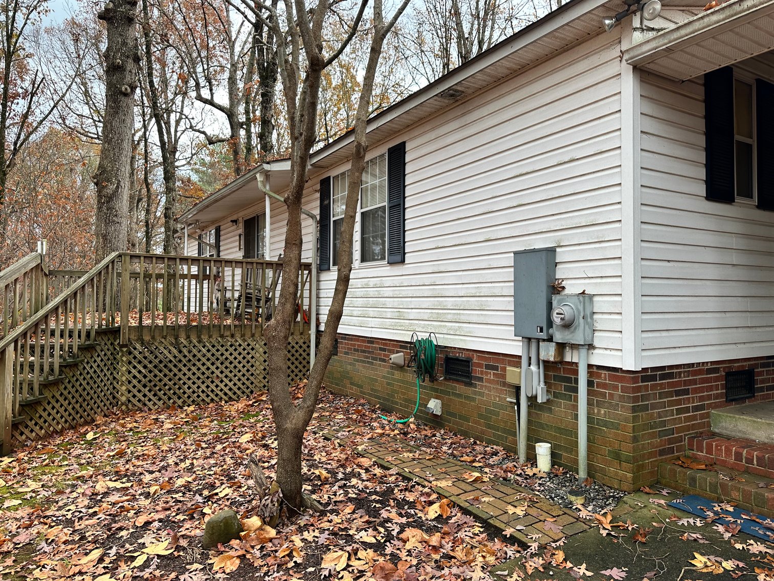 Troutman Home with 2+/- Acres and Multiple Out Buildings Auction