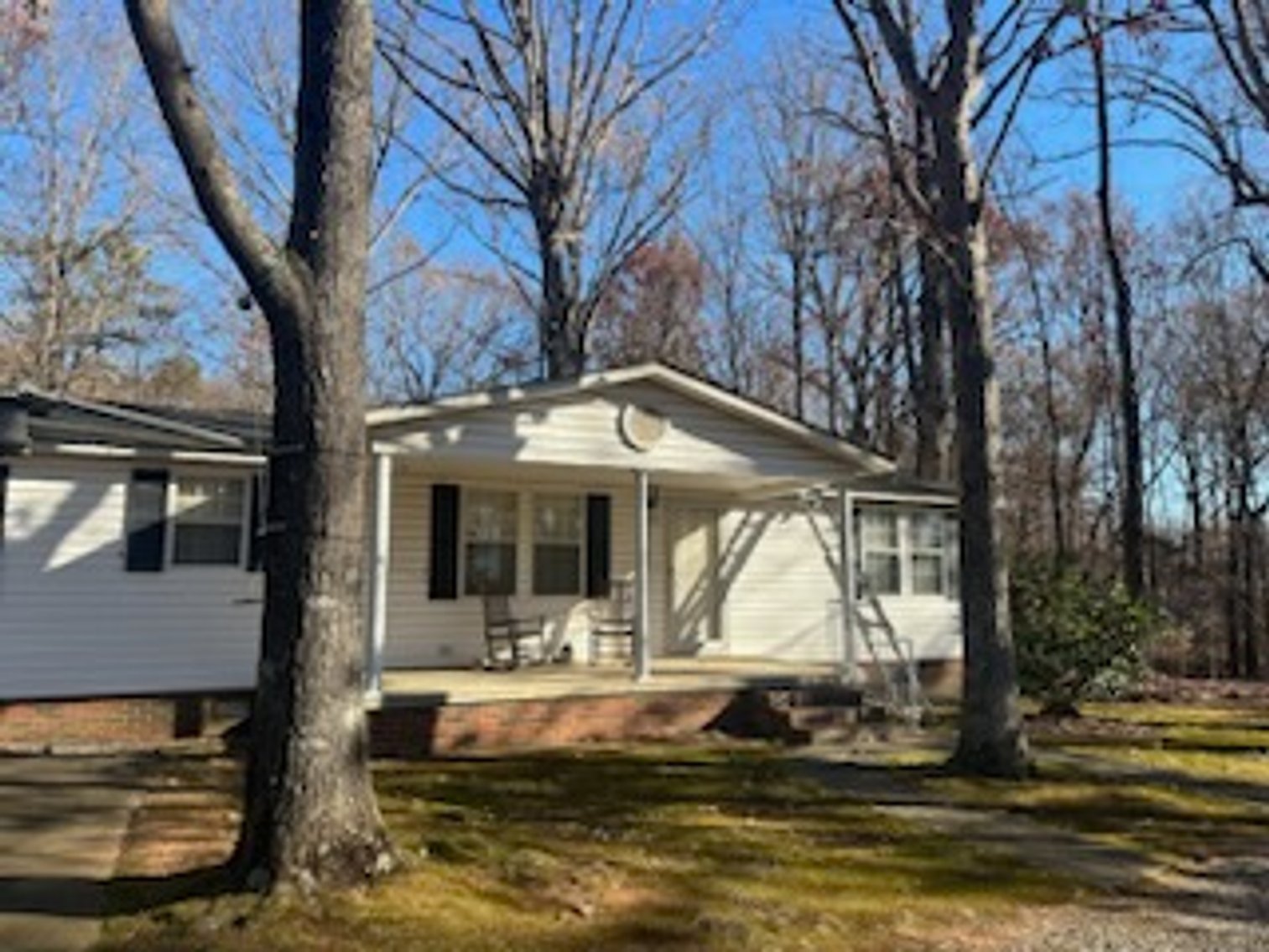 Troutman Home with 2+/- Acres and Multiple Out Buildings Auction