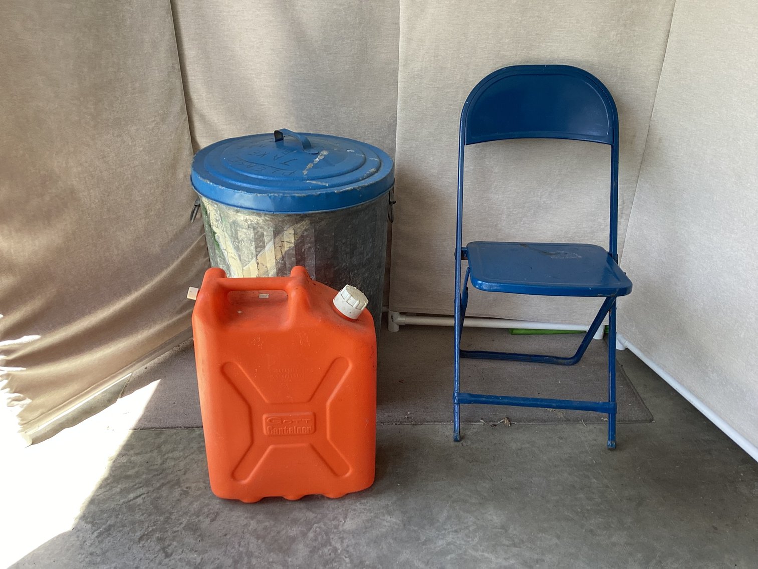 Image for Fuel Can, Trash Can, and Folding Chair