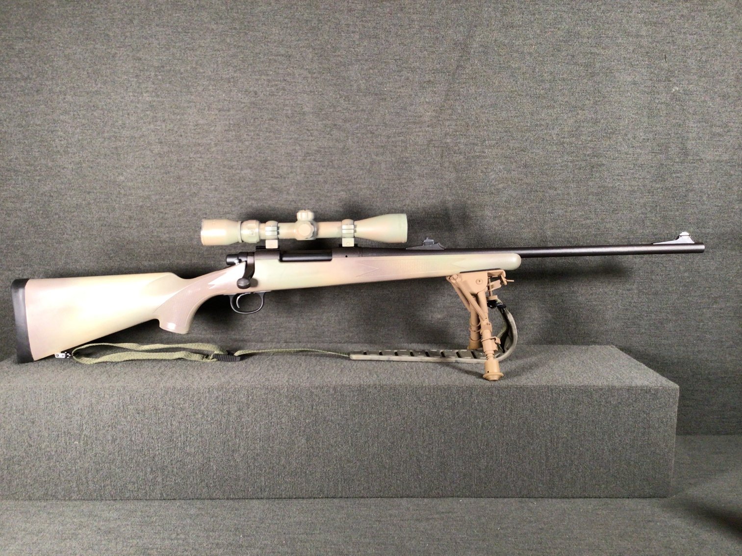 Image for Remington Model 700 30-06 Sprg cal, bolt-action rifle and case