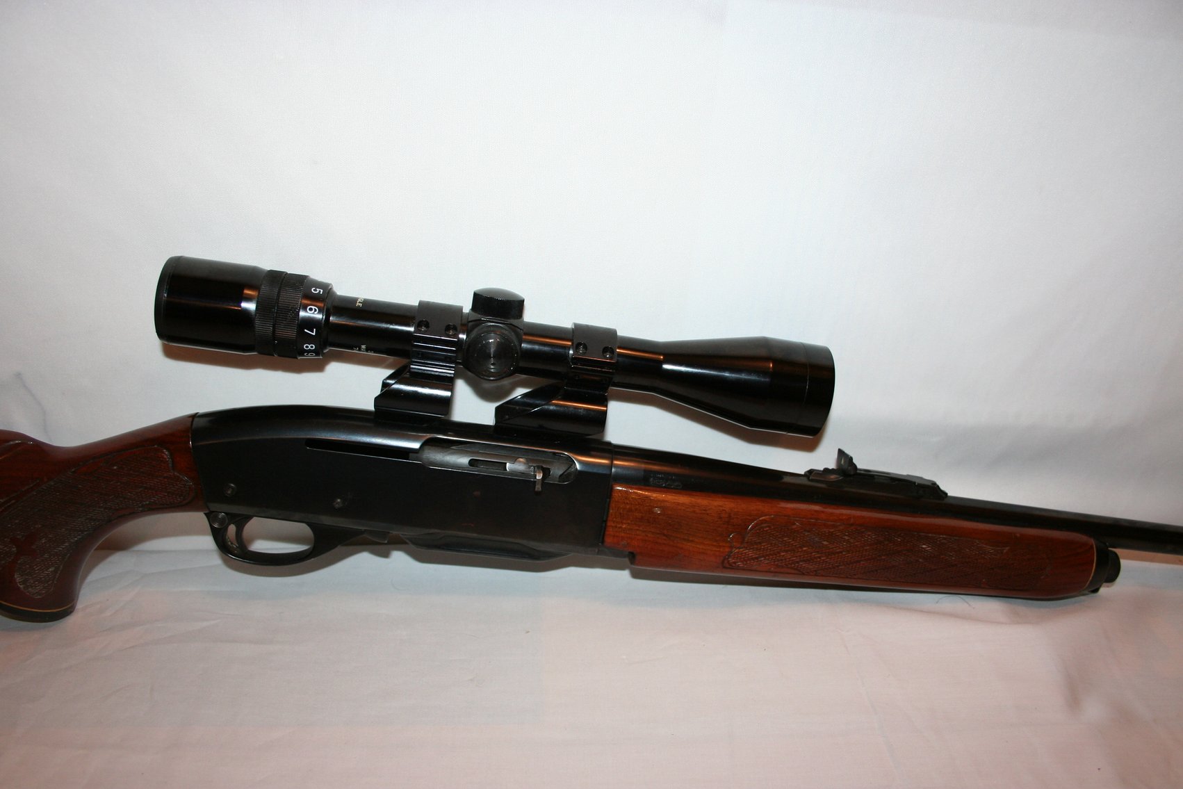 Image for Remington Woodmater Model 742 - 30-06 Springfield Automatic - Bushnel 3X9X38 Sportview Scope with Peep Sights - Walnut Stock #366224