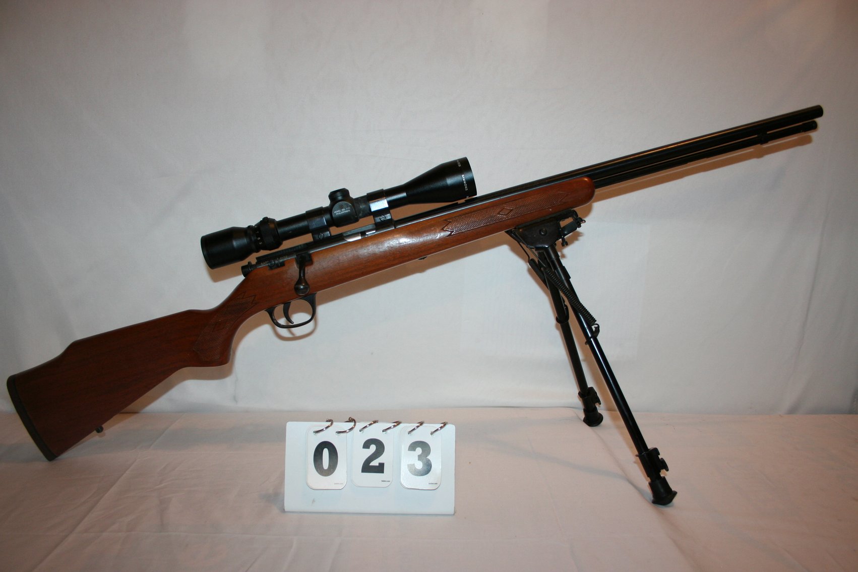 Image for Marlin Model 883 - 22 Cal WMR Only - Bolt Action - Folding Bi-Pod - Simmons 3X9 Model #7711 - Walnut Checkered Stock #10666116