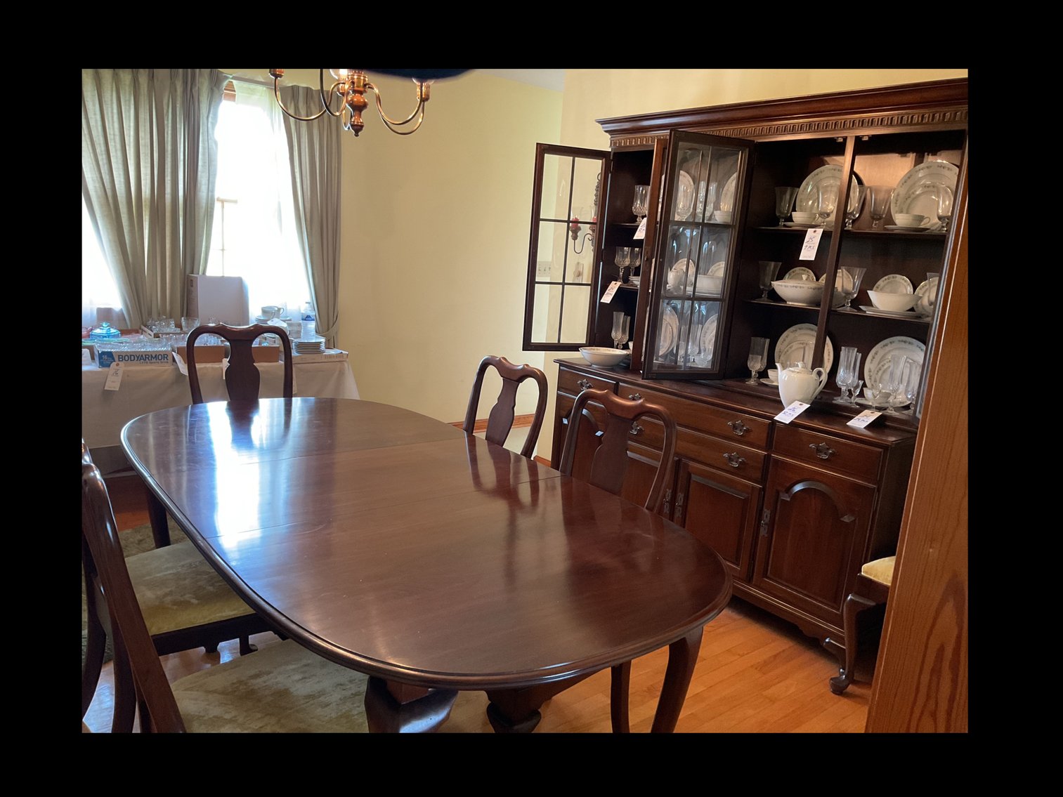 Image for 8 piece Queen Anne dining set includes table with 2 leaves and 6 chairs and a beautiful Brakefront 66Lx 77H with 8 doors and 4 drawers