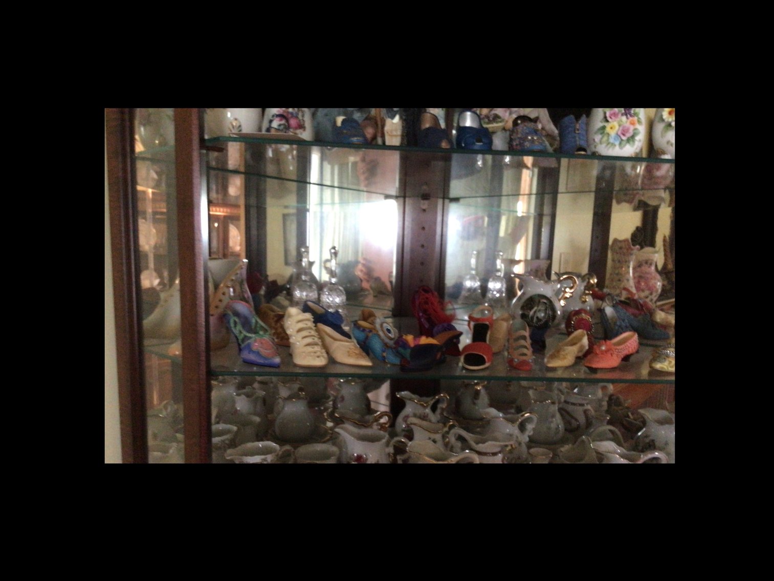 Image for Collection of miniature shoes and crystal bell