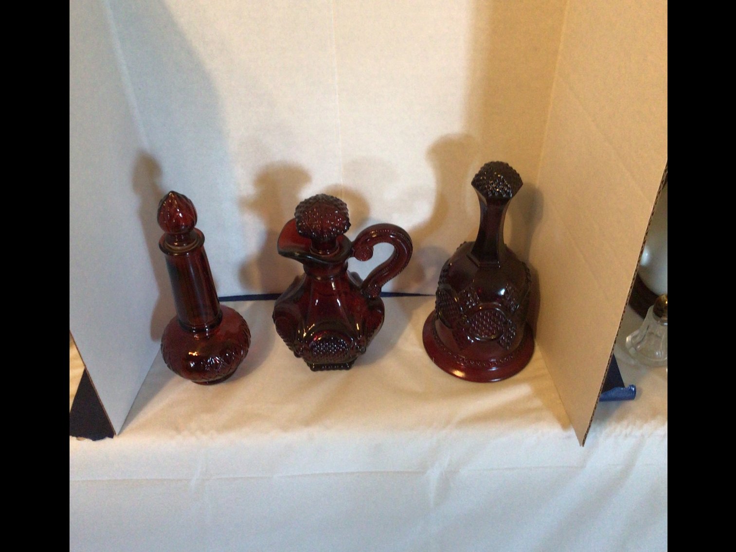 Image for Set of 3 Avon bottles with bell