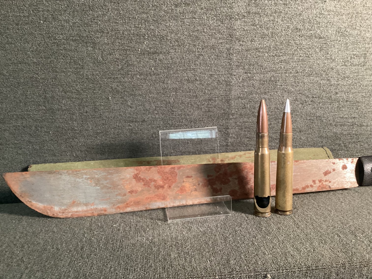 Image for Machete and 2 50 cal Bullets