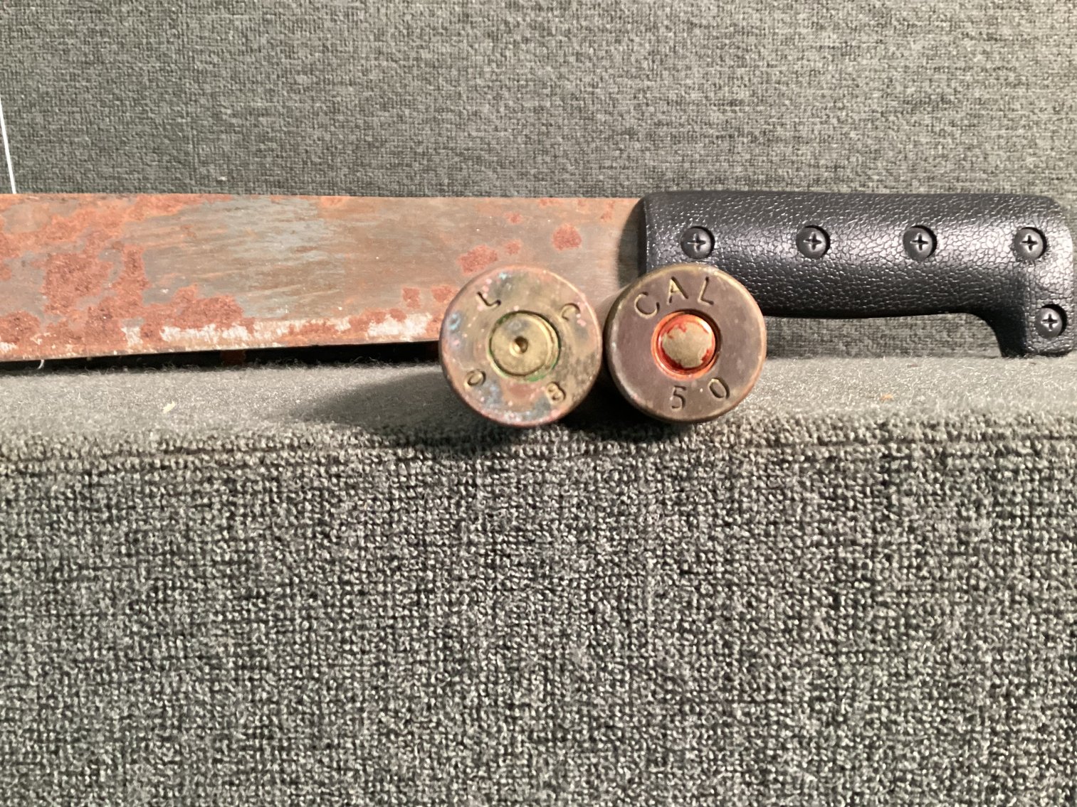 Image for Machete and 2 50 cal Bullets