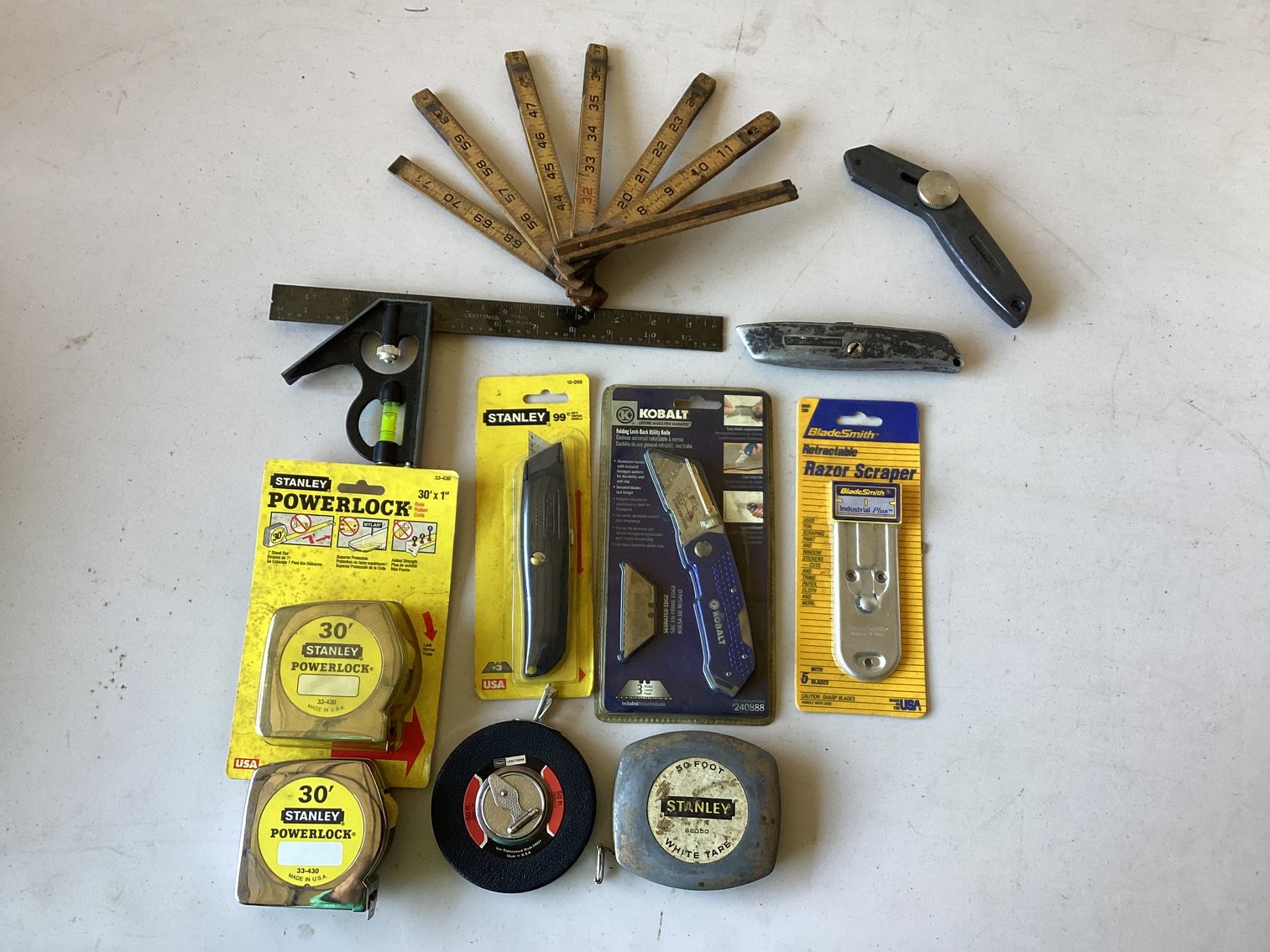 Image for Measuring Tapes & Boxcutter Lot