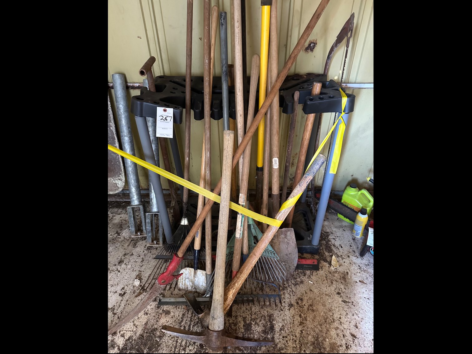 Image for Yard tools and stand with vintage wheelbarrow