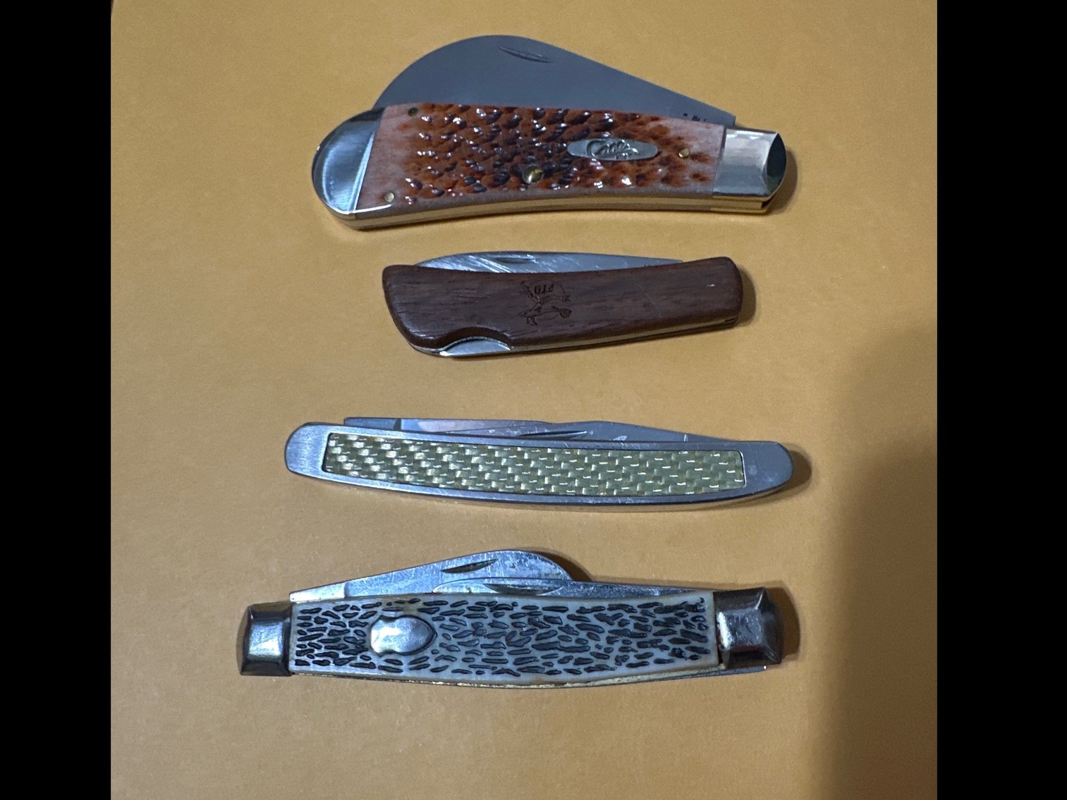 Image for Four pocket knives, one case
