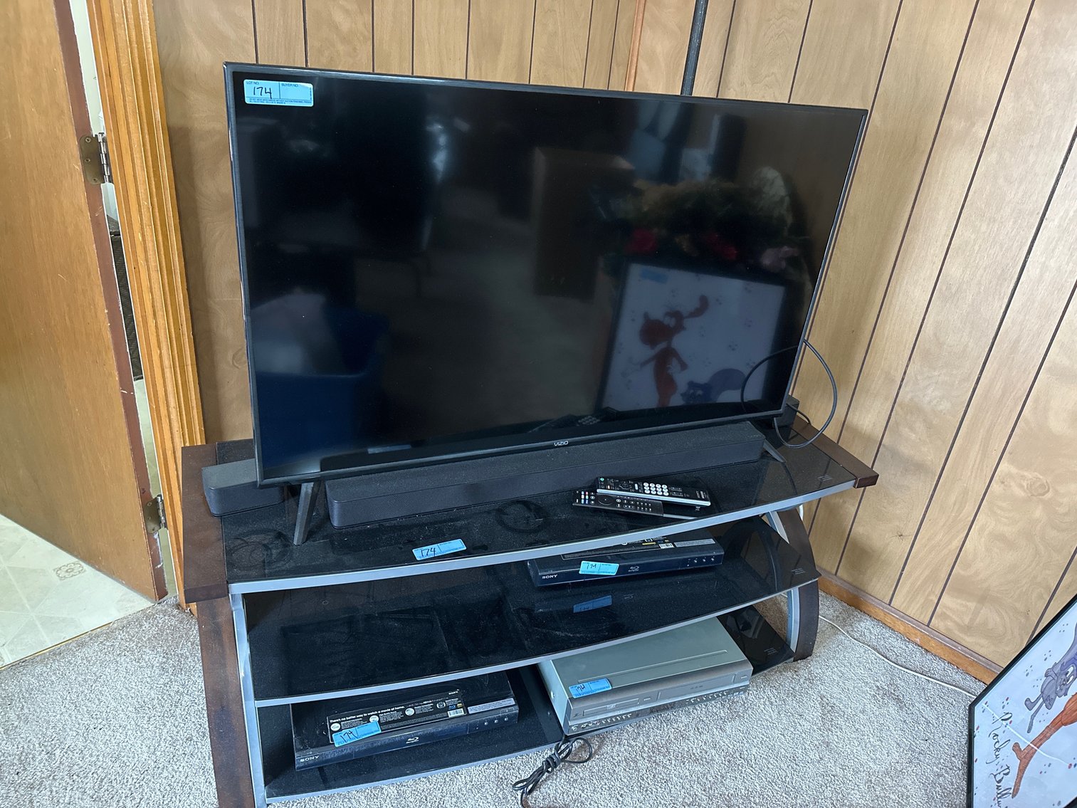 Image for Vizio TV and TV stand with Blu-ray DVD players