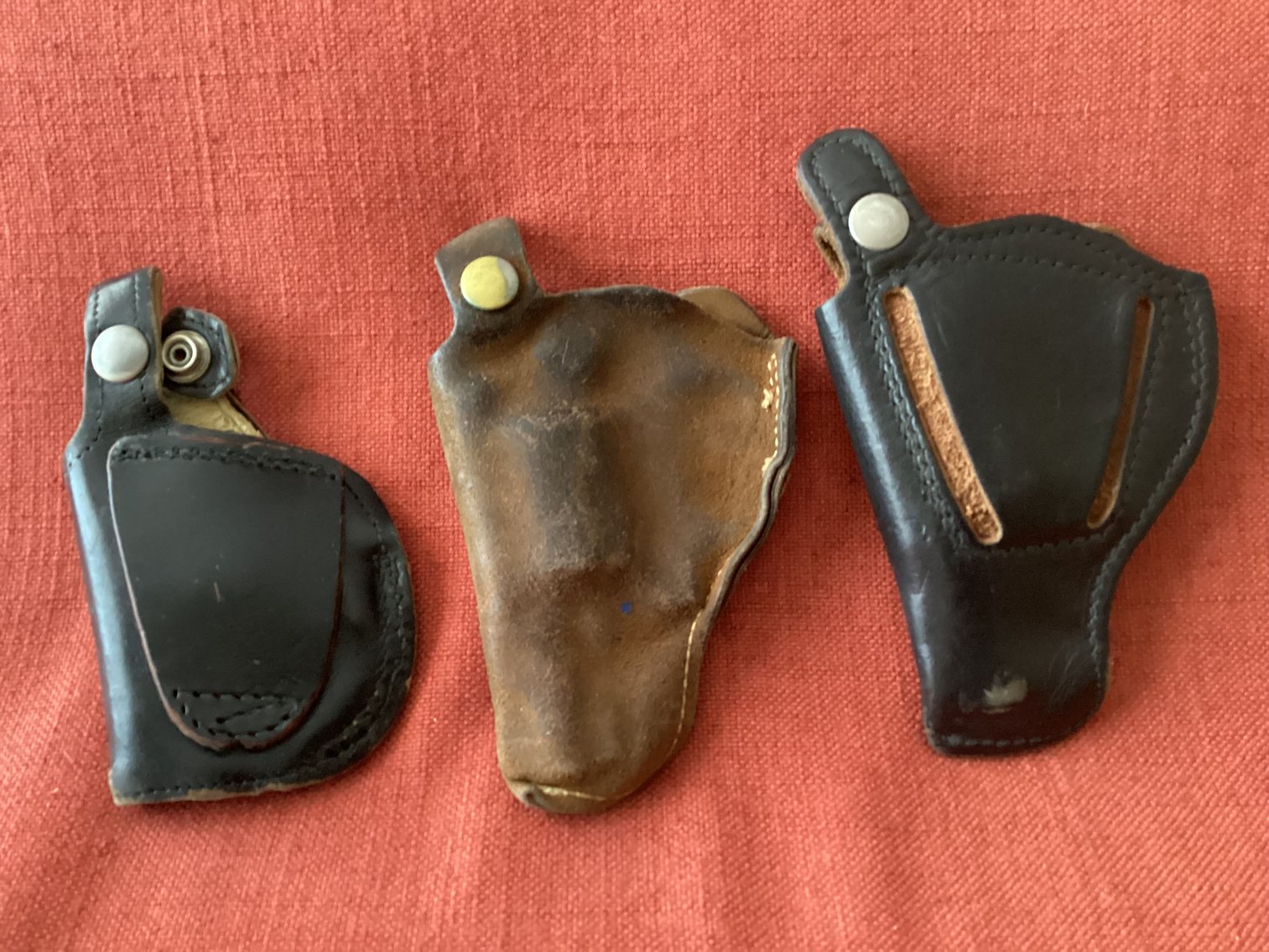 Image for Three Leather Holsters for Small Frame Hand Guns