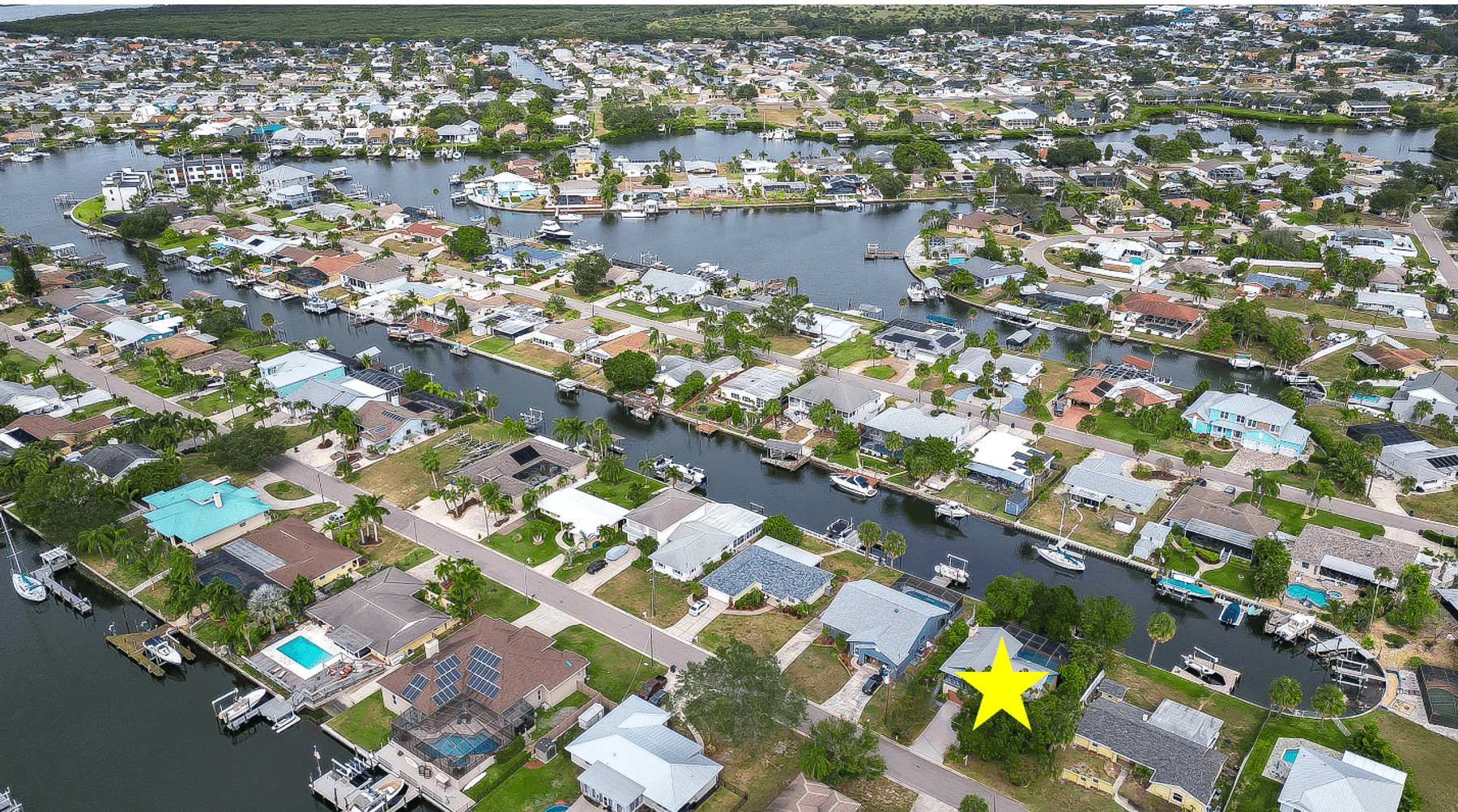 Image for For Sale ONLY at AUCTION this Waterfront 3BR/2.5BA Pool Home with Dock Just Minutes by Boat to Tampa Bay!