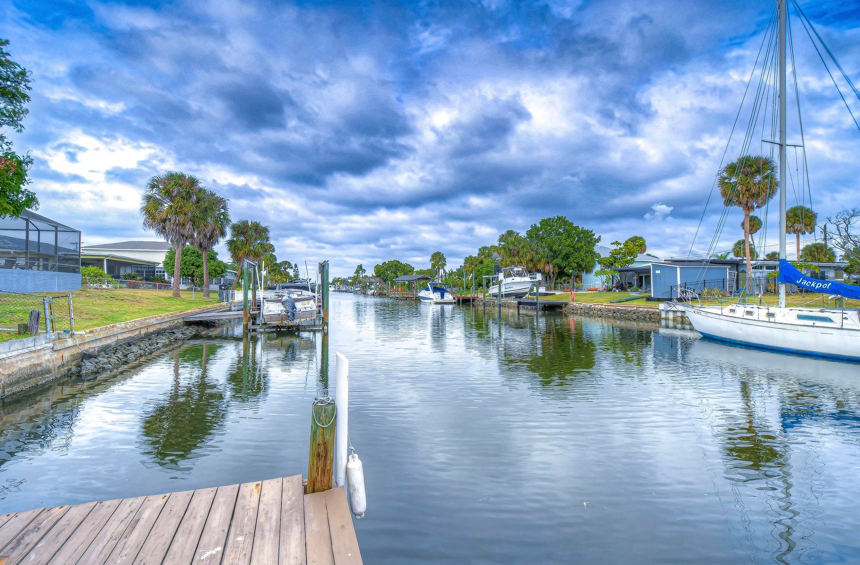 Image for For Sale ONLY at AUCTION this Waterfront 3BR/2.5BA Pool Home with Dock Just Minutes by Boat to Tampa Bay!