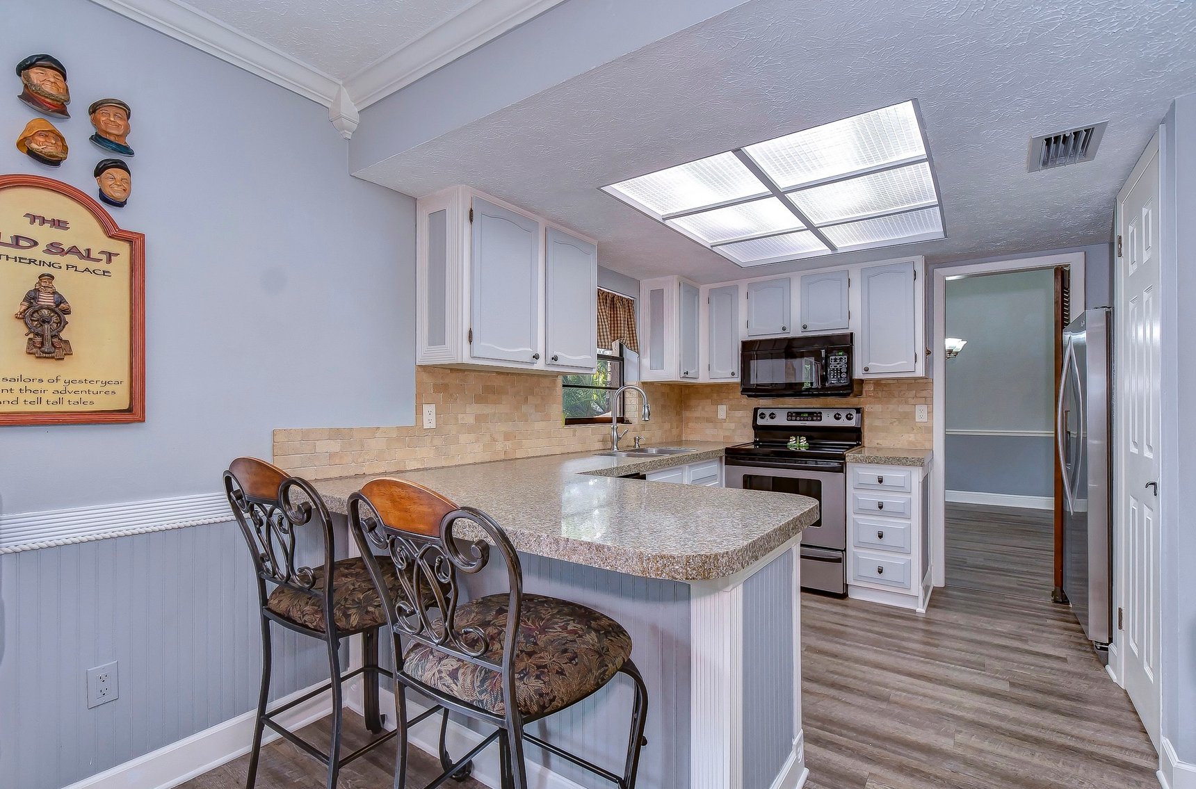 Image for For Sale ONLY at AUCTION this Waterfront 3BR/2.5BA Pool Home with Dock Just Minutes by Boat to Tampa Bay!