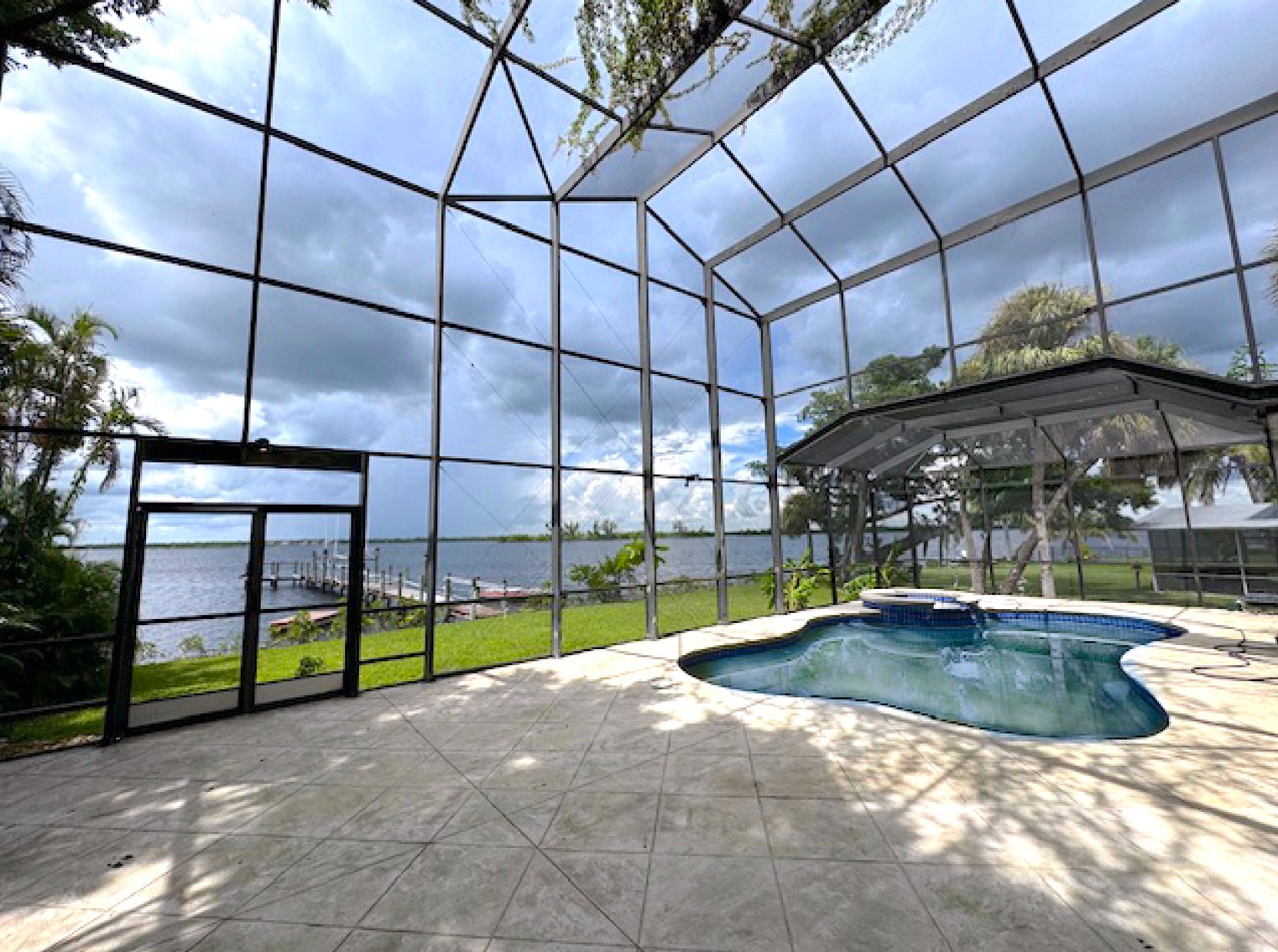 Image for For Sale Waterfront 5+ Bedroom / 3 Bath Pool Home with Dock!