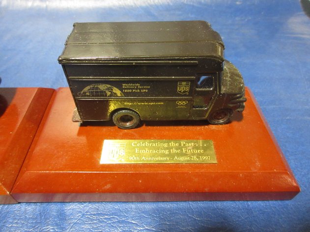 Image for UPS 1997 die cast Brown trucks on wood awards