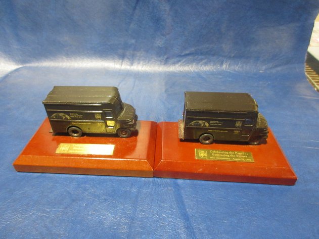 Image for UPS 1997 die cast Brown trucks on wood awards