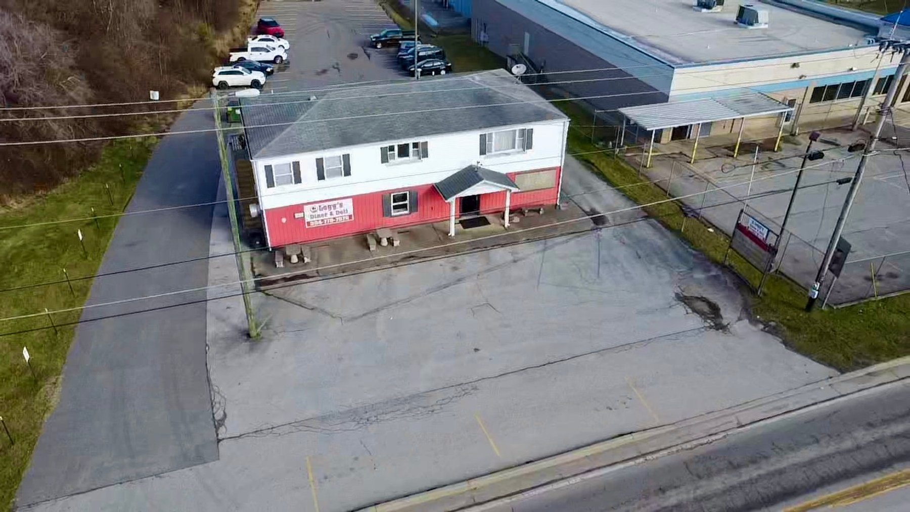 Image for SOLD $220,000 - Commercial Building with Two Apartments on a Major Thoroughfare