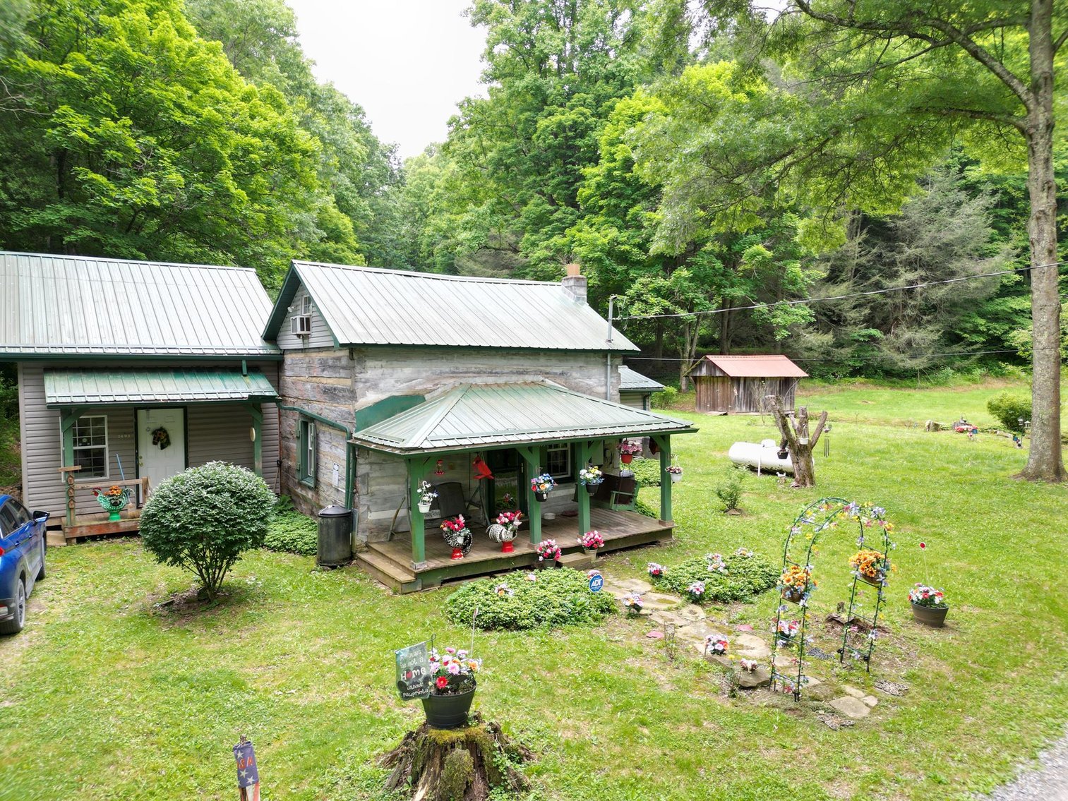 Image for SOLD $209,000 - Remodeled 1800s Log Cabin on 22 Acres in Harrison County