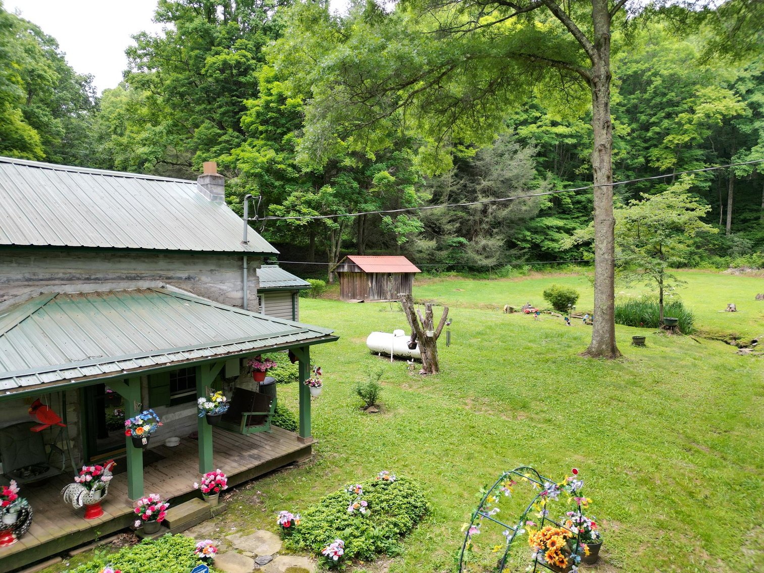 Image for SOLD $209,000 - Remodeled 1800s Log Cabin on 22 Acres in Harrison County