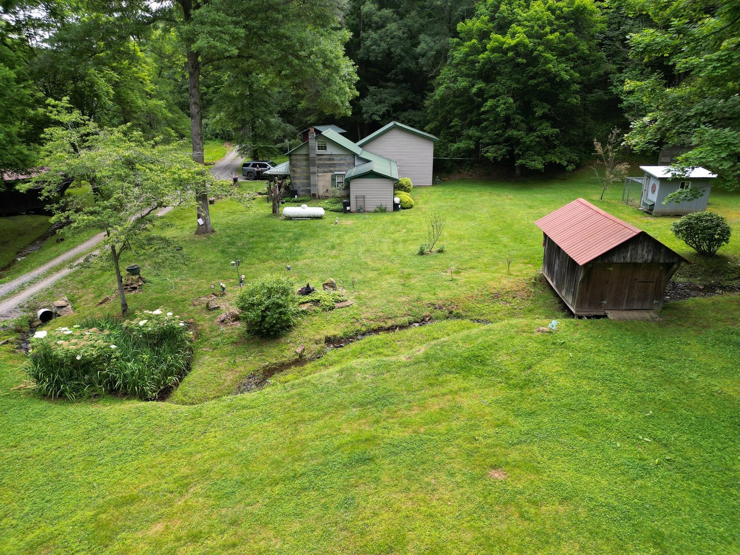 Image for SOLD $209,000 - Remodeled 1800s Log Cabin on 22 Acres in Harrison County