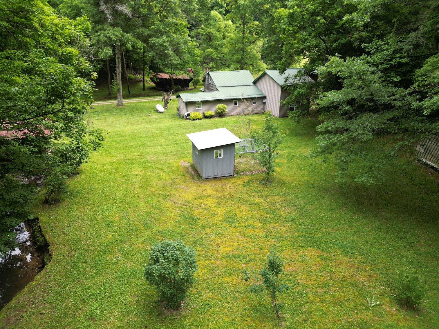 Image for SOLD $209,000 - Remodeled 1800s Log Cabin on 22 Acres in Harrison County