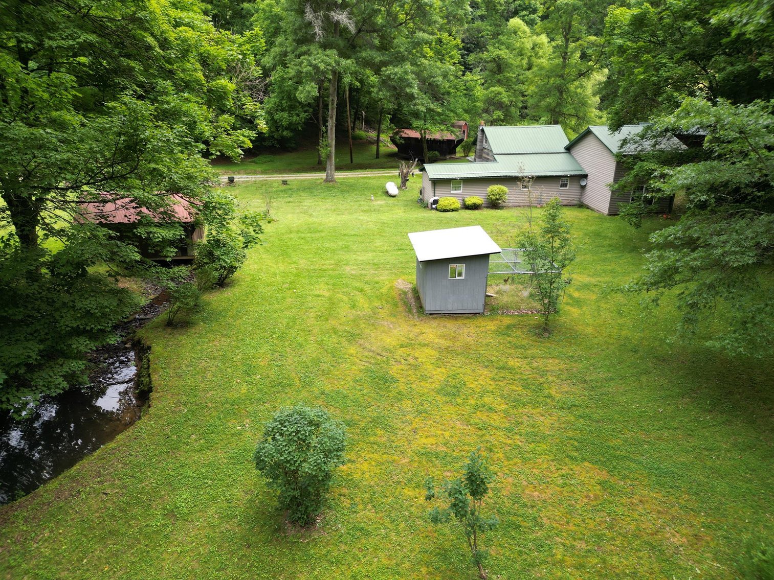 Image for SOLD $209,000 - Remodeled 1800s Log Cabin on 22 Acres in Harrison County