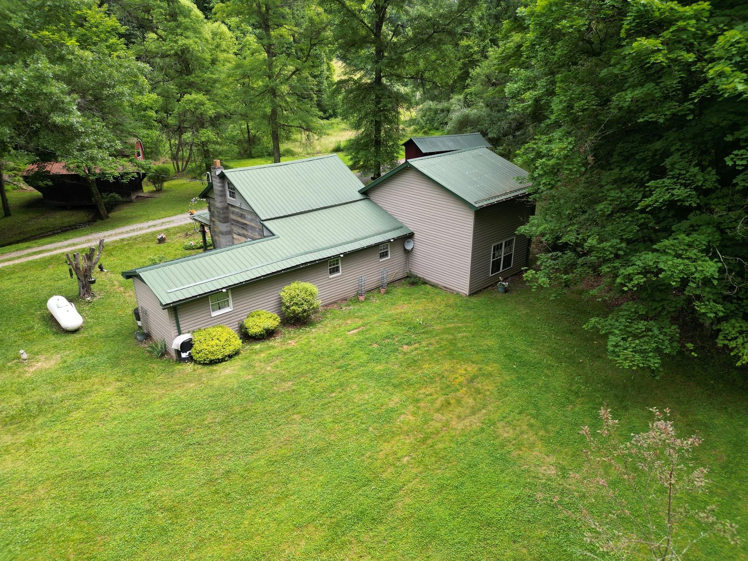 Image for SOLD $209,000 - Remodeled 1800s Log Cabin on 22 Acres in Harrison County