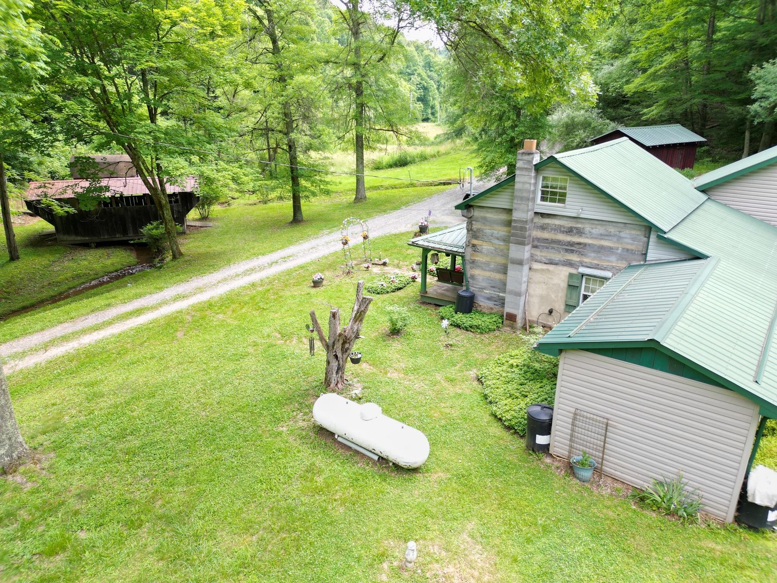 Image for SOLD $209,000 - Remodeled 1800s Log Cabin on 22 Acres in Harrison County