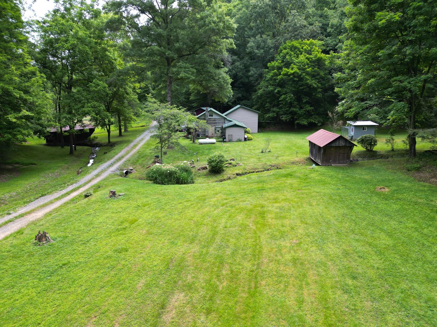 Image for SOLD $209,000 - Remodeled 1800s Log Cabin on 22 Acres in Harrison County