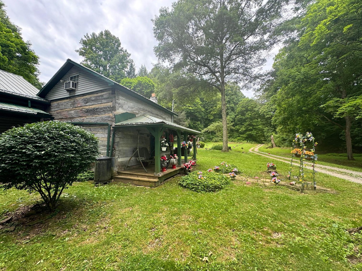 Image for SOLD $209,000 - Remodeled 1800s Log Cabin on 22 Acres in Harrison County