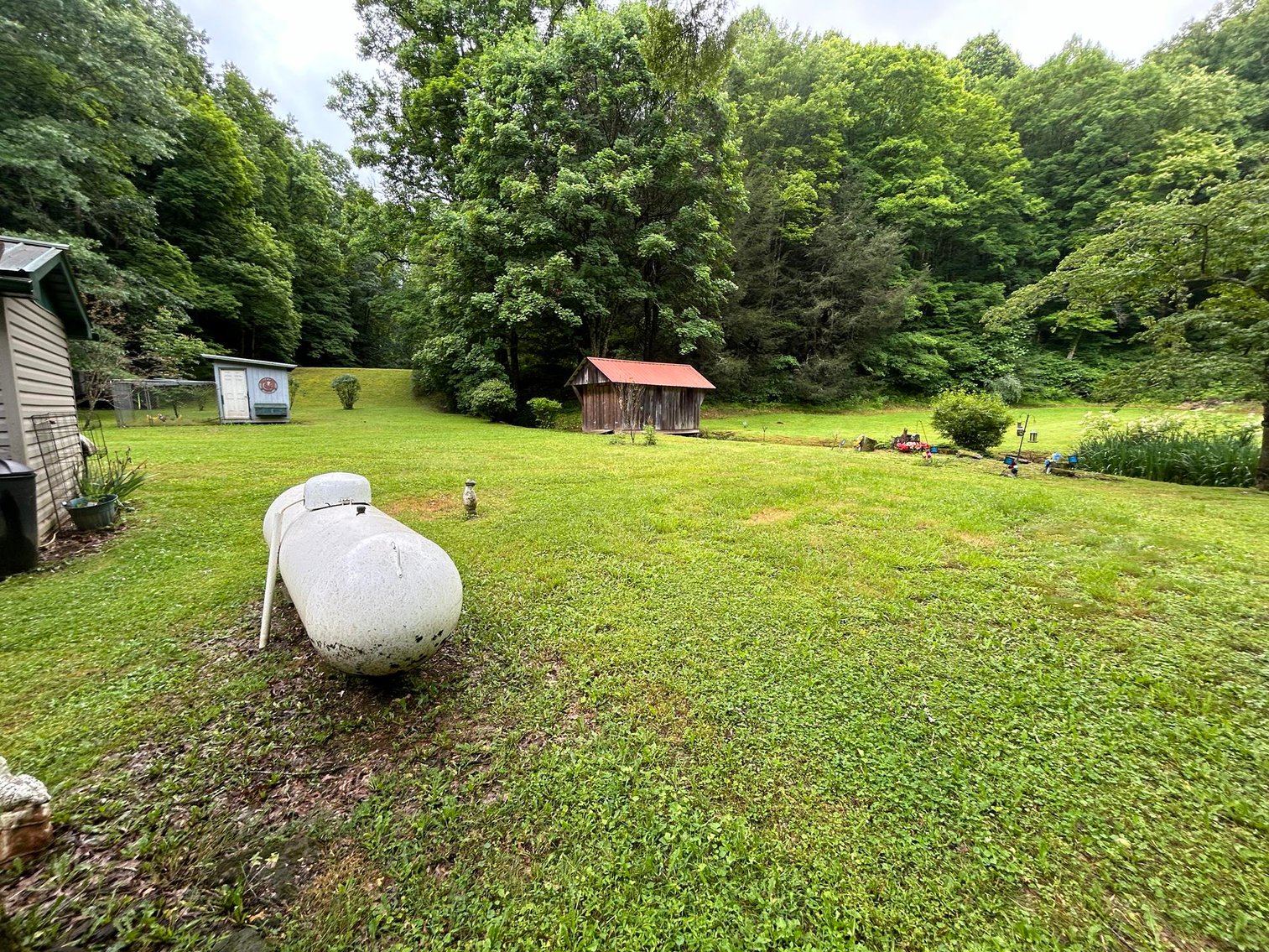 Image for SOLD $209,000 - Remodeled 1800s Log Cabin on 22 Acres in Harrison County