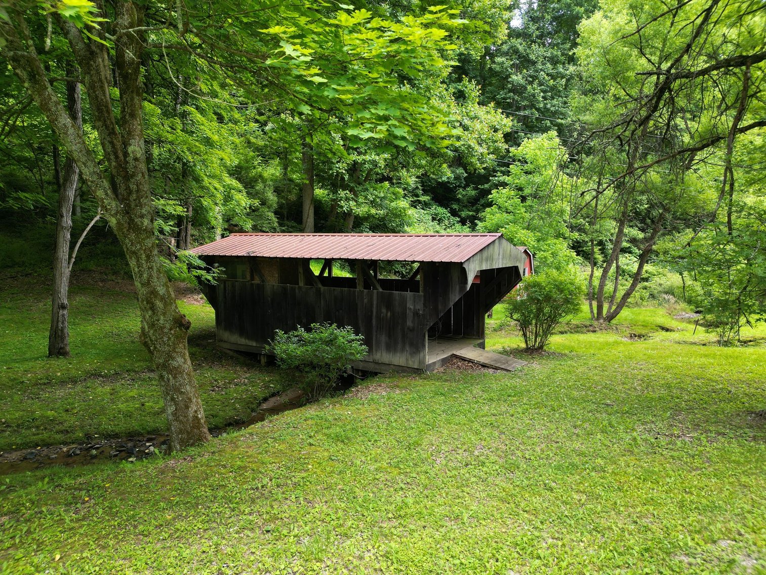 Image for SOLD $209,000 - Remodeled 1800s Log Cabin on 22 Acres in Harrison County