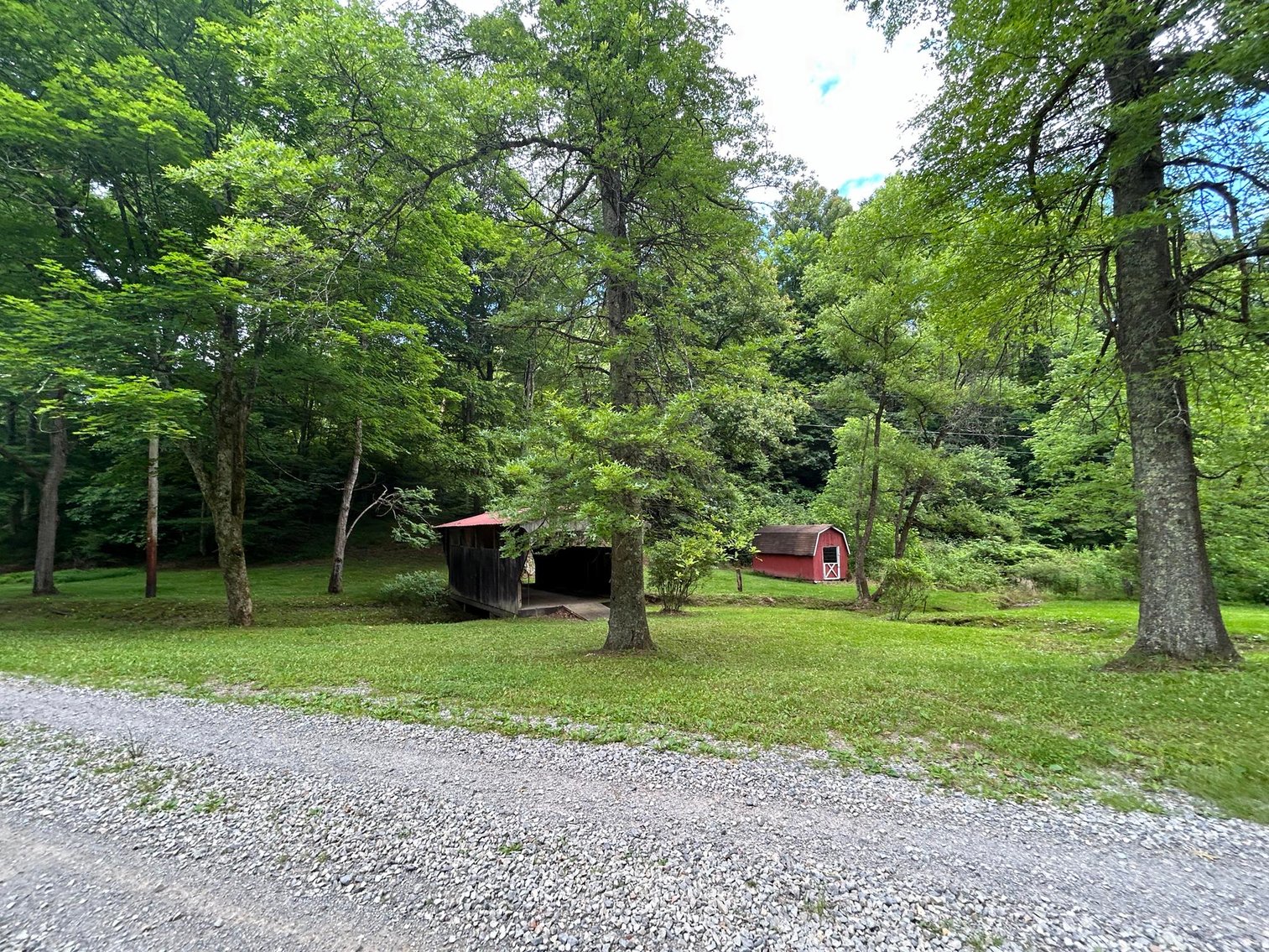 Image for SOLD $209,000 - Remodeled 1800s Log Cabin on 22 Acres in Harrison County