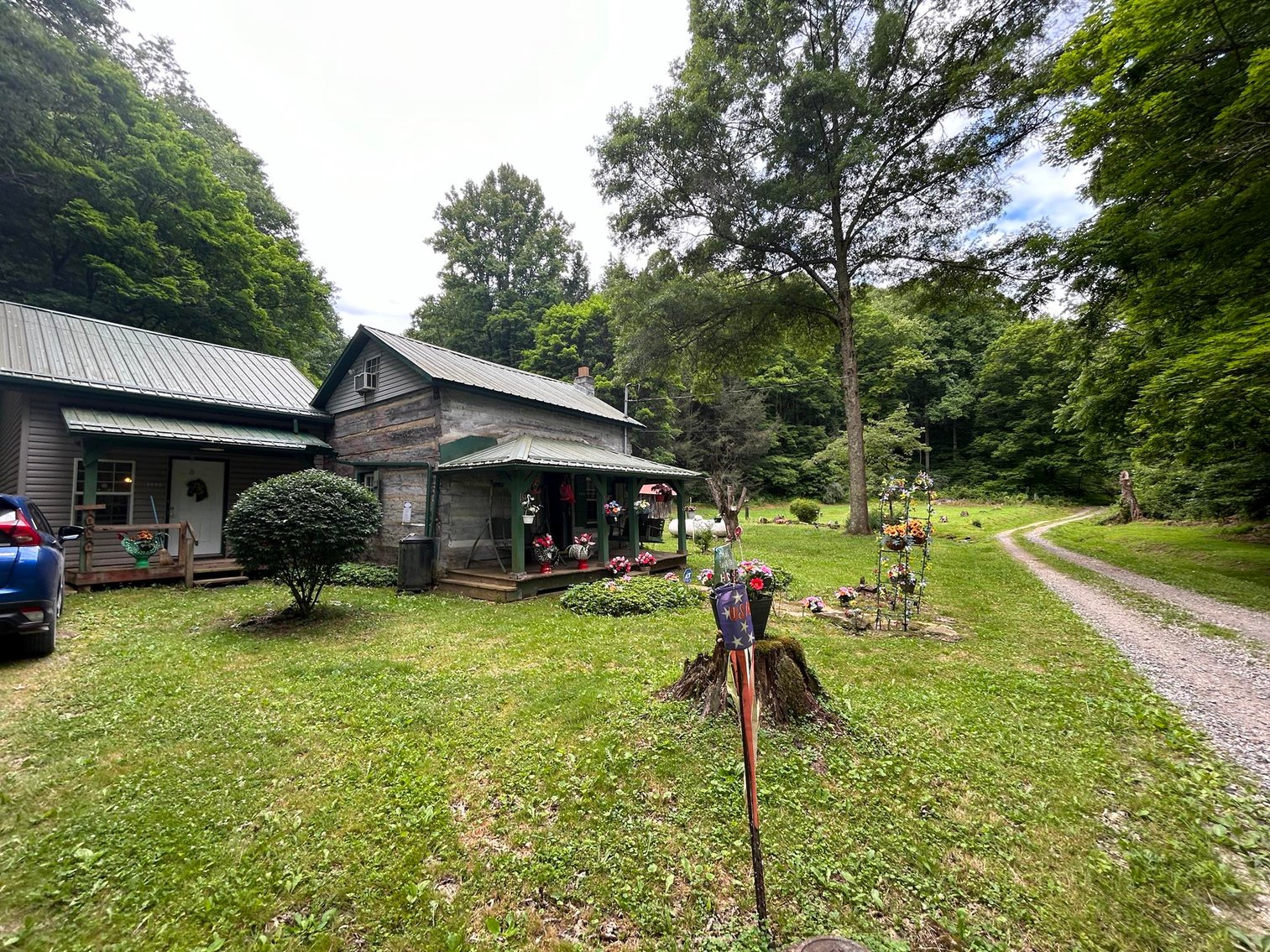 Image for SOLD $209,000 - Remodeled 1800s Log Cabin on 22 Acres in Harrison County
