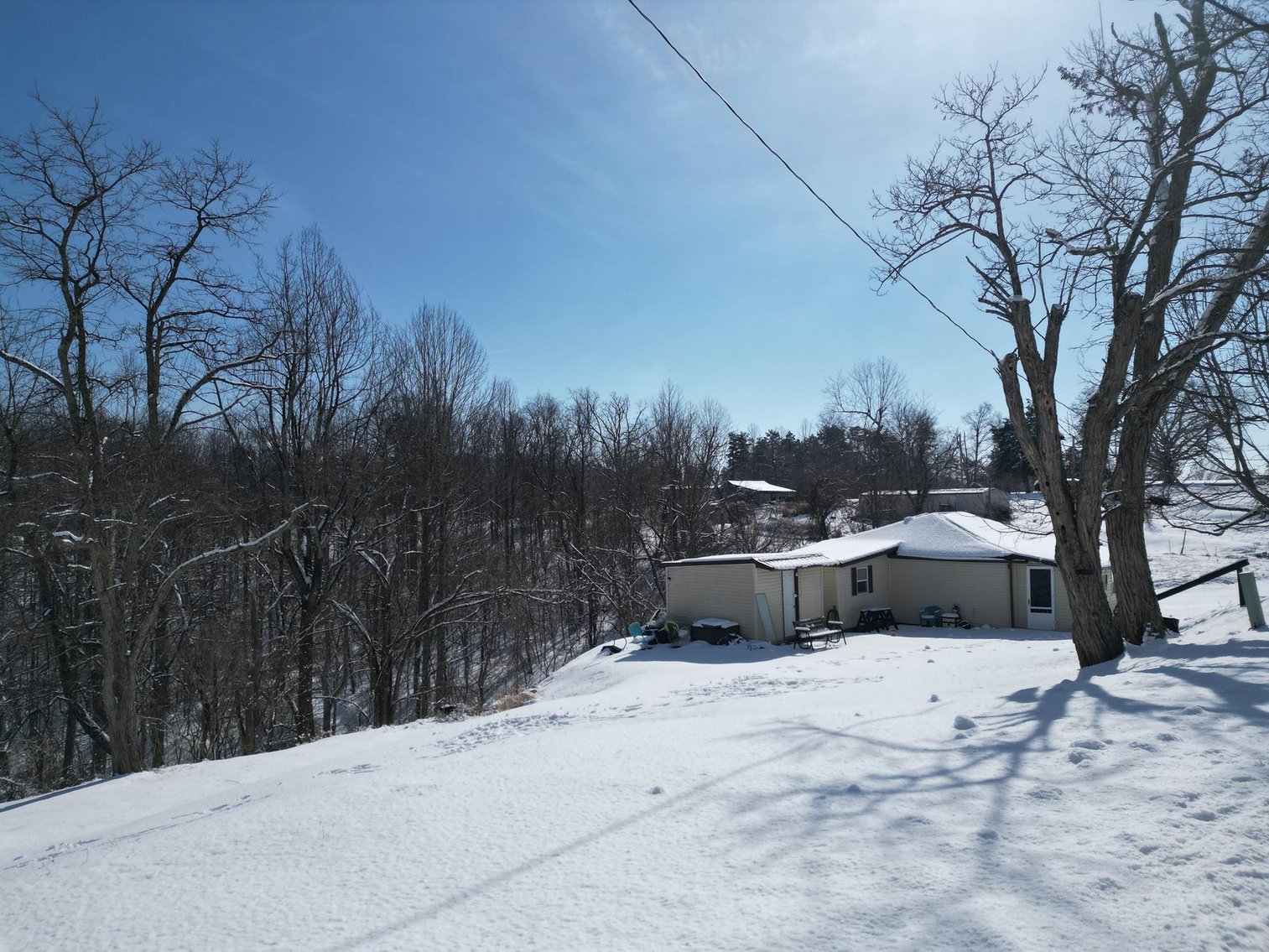 Image for SOLD $49,500 - Secluded 7.48-Acre Getaway Property with Cabin, Home & Trails in Mason County