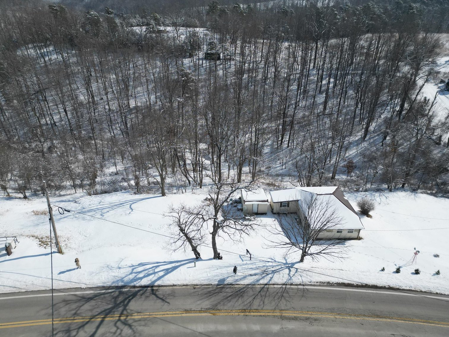 Image for SOLD $49,500 - Secluded 7.48-Acre Getaway Property with Cabin, Home & Trails in Mason County