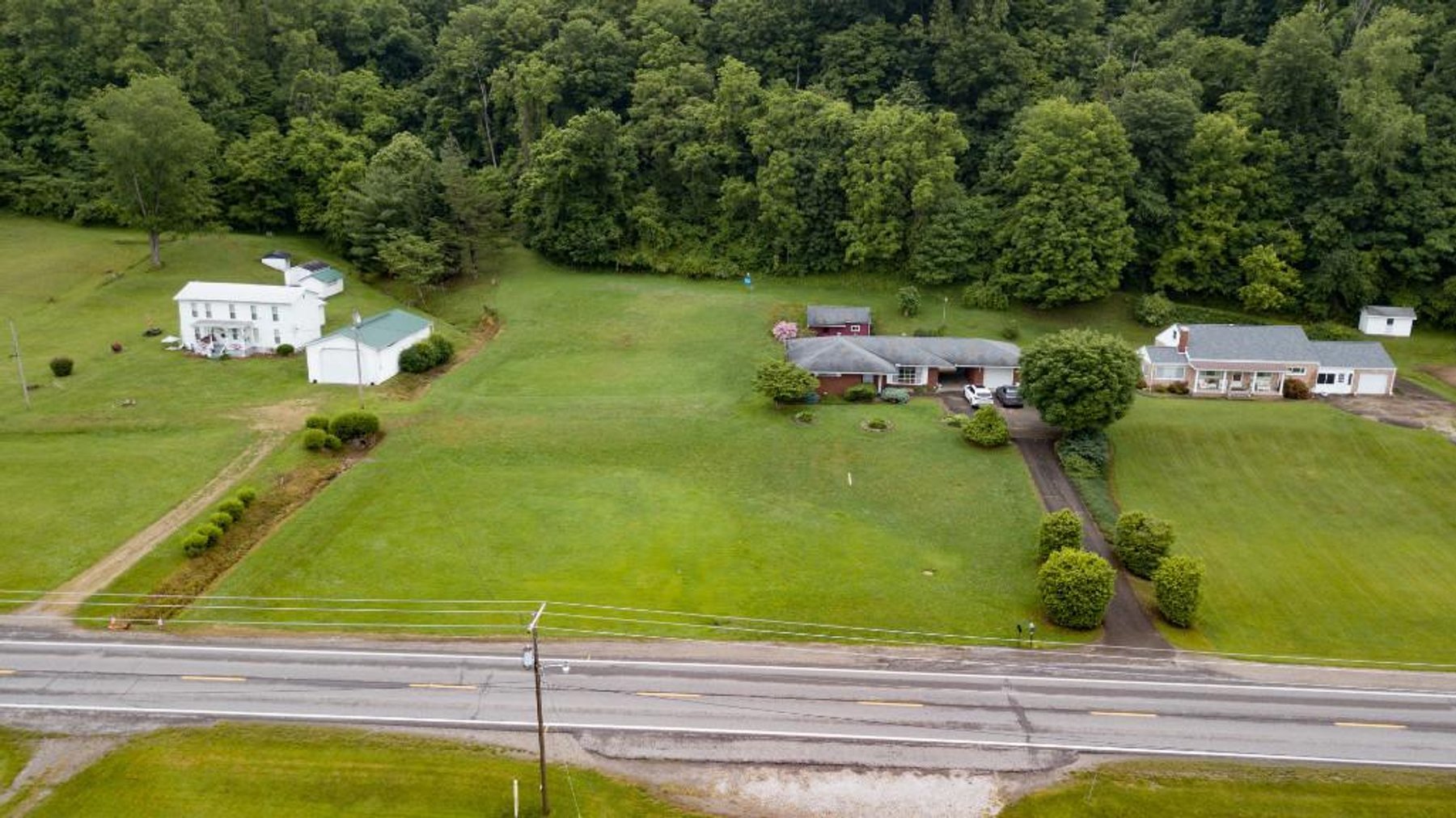 Image for SOLD $254,100 - Two Homes & Land on the River