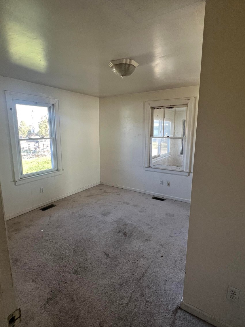 Image for SOLD $73,700 - Home and Income Generating Apartment Selling to the Highest Bidder