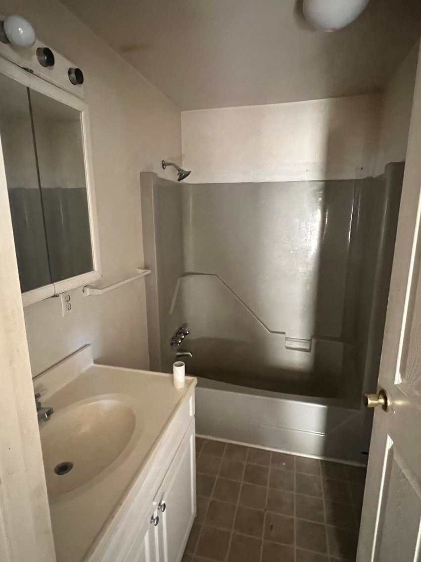 Image for SOLD $73,700 - Home and Income Generating Apartment Selling to the Highest Bidder