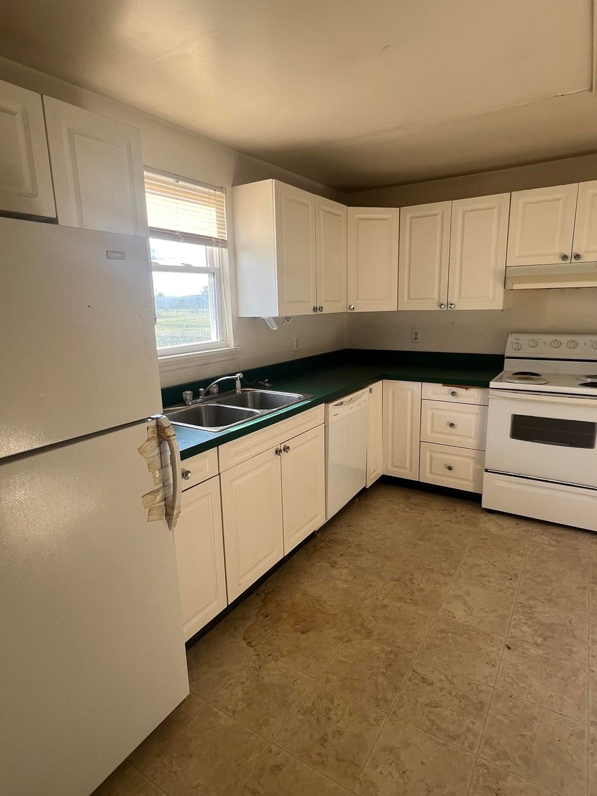 Image for SOLD $73,700 - Home and Income Generating Apartment Selling to the Highest Bidder