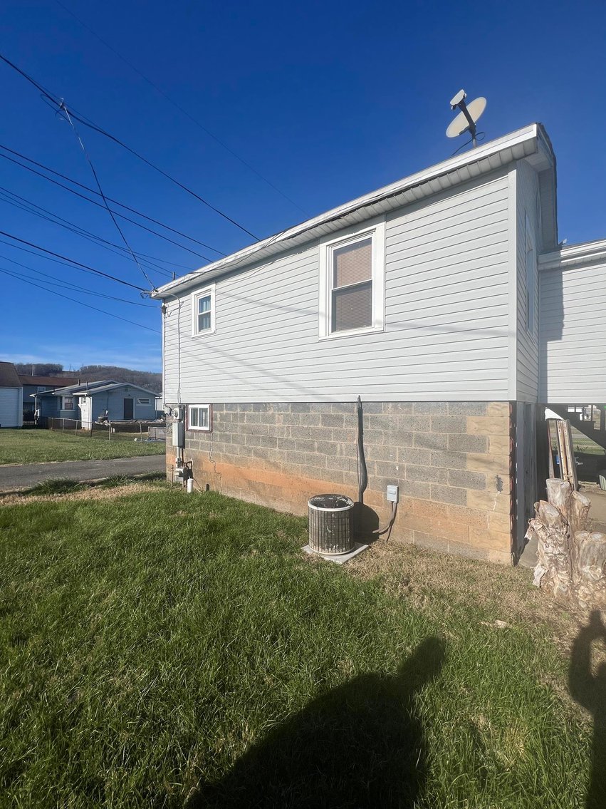 Image for SOLD $73,700 - Home and Income Generating Apartment Selling to the Highest Bidder